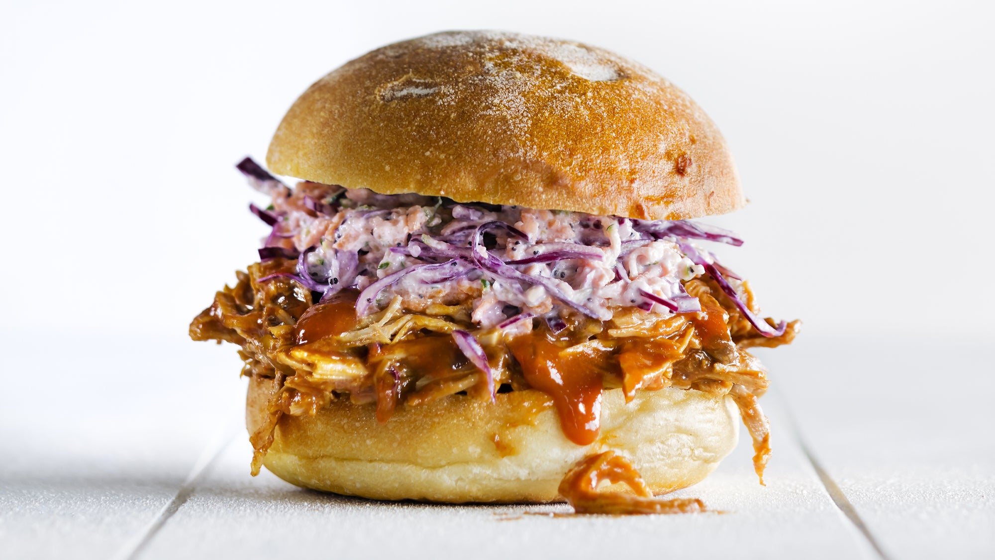 https://cdn.cleaneatingmag.com/wp-content/uploads/2015/05/CE51_Slow-Cooker-Pulled-Pork-Sandwiches-web.jpg