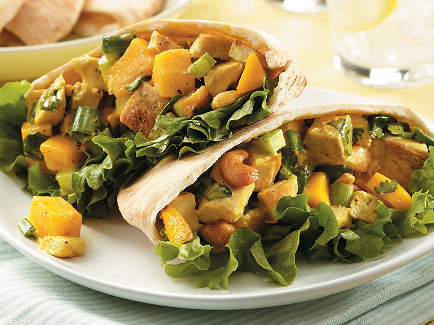 https://cdn.cleaneatingmag.com/wp-content/uploads/2016/04/curried-chicken-salad-with-mango-cashews.jpg?crop=4:3&width=1600