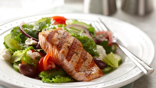 Greek salad with grilled salmon