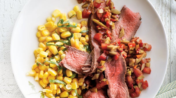 Olive Relish Topped Steak Over Corn Basil Sauté