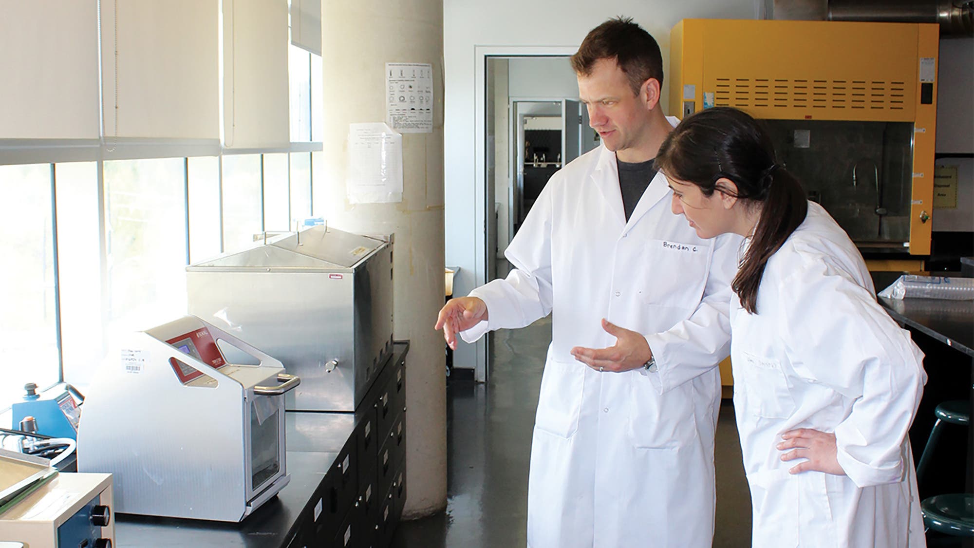 Fermented-Foods-Sidebar_Dr-Chapman-&-Andrea-Gourgy-73-web Dr. Chapman (left) shows Executive Editor Andrea Gourgy how the probiotic mixtures are homogenized during testing.