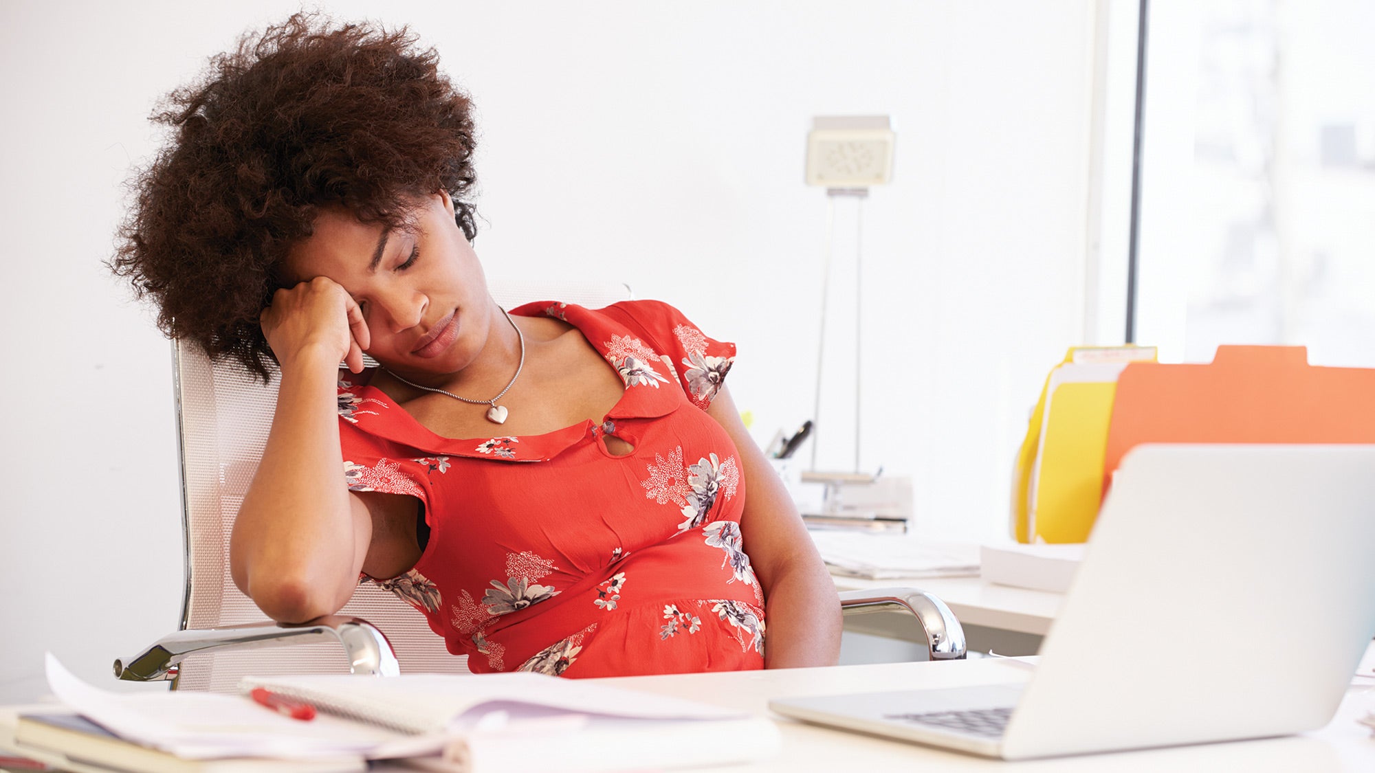 Woman sleeping sitting up