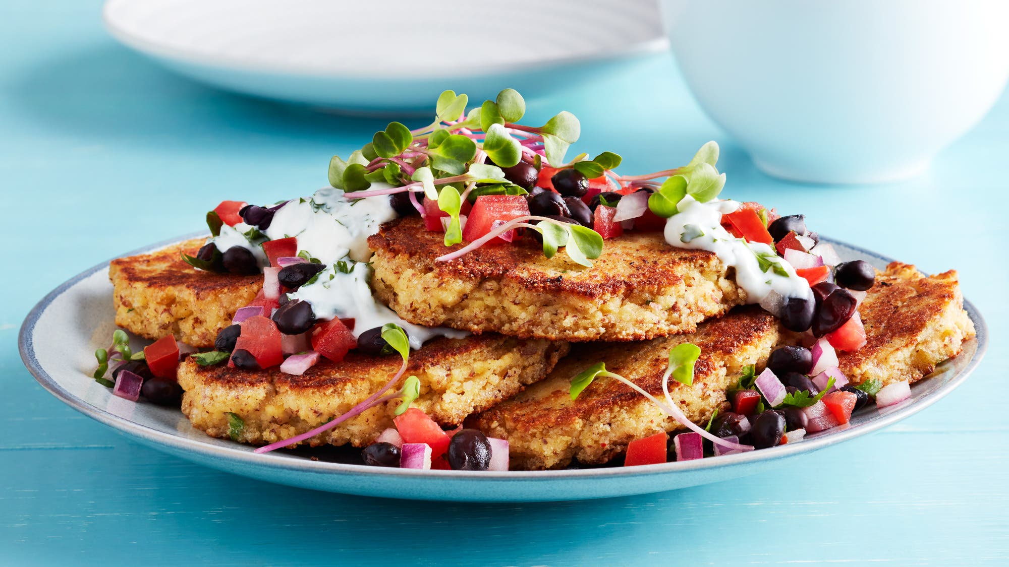 Cornmeal Pancakes with Black Bean Salsa & Cilantro Yogurt