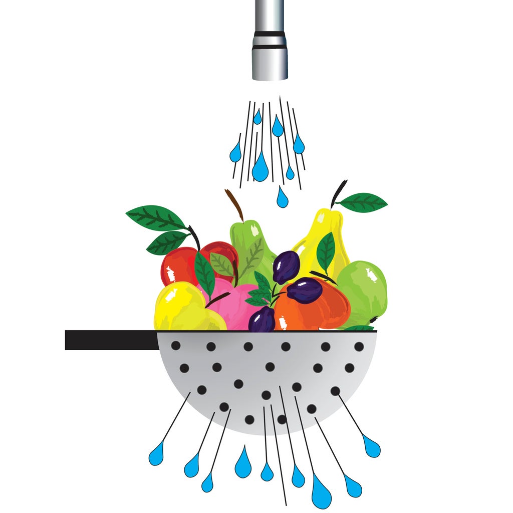 Metal colander and fruit. Illustration of colander with fruit placed under the water