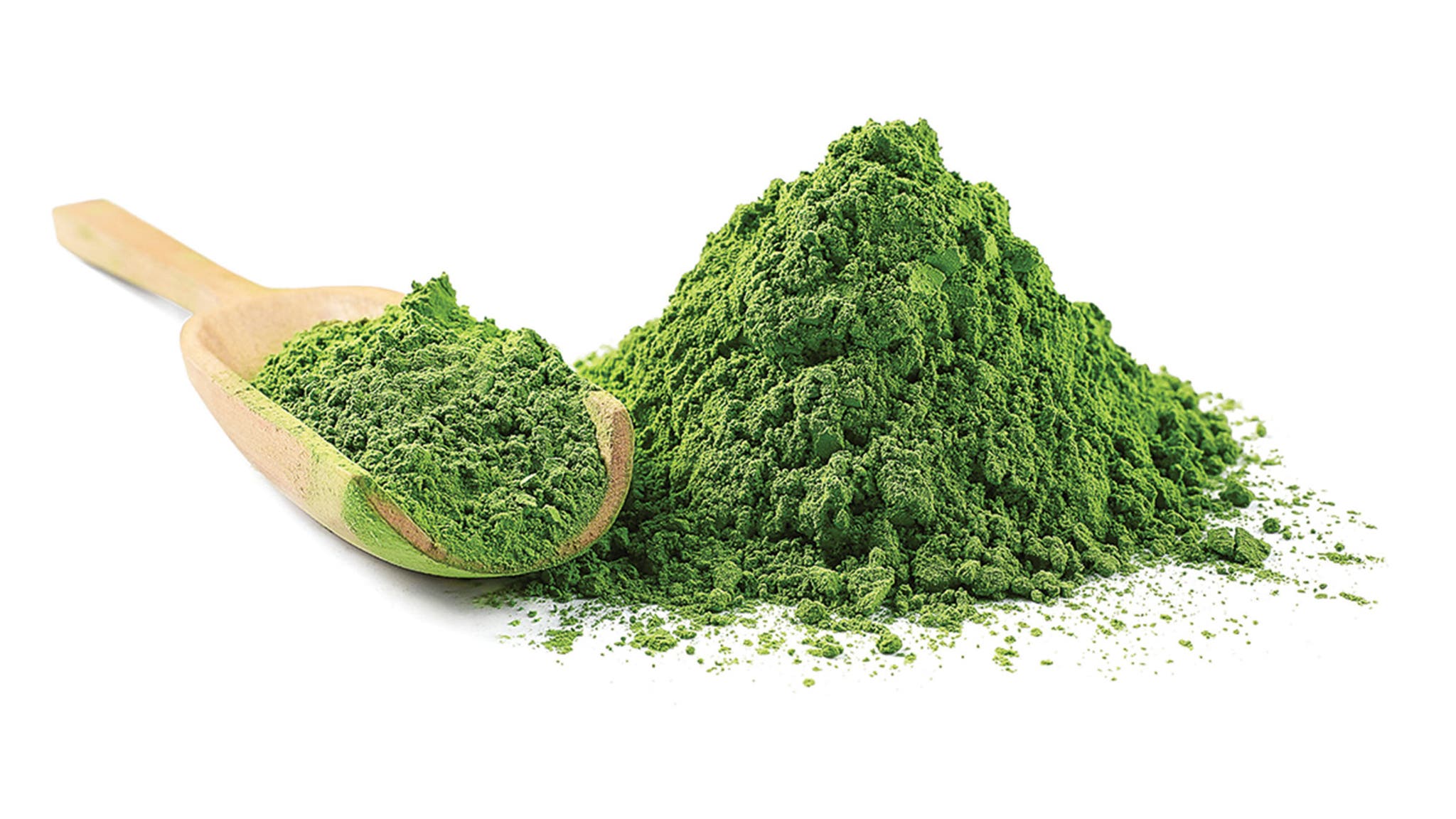 Powdered green protein on white background