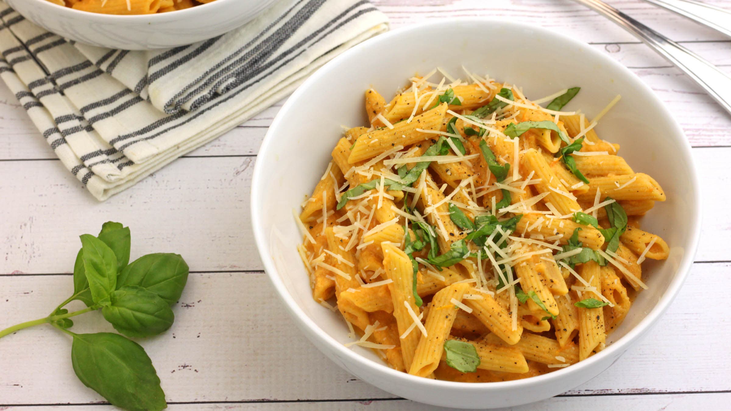 Roasted garlic tomato pasta in a bowl