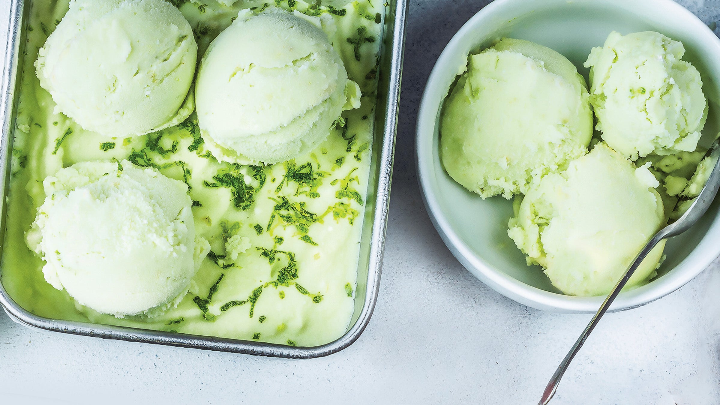 Sheet pan and bowl of Coconut Lime Ice Cream