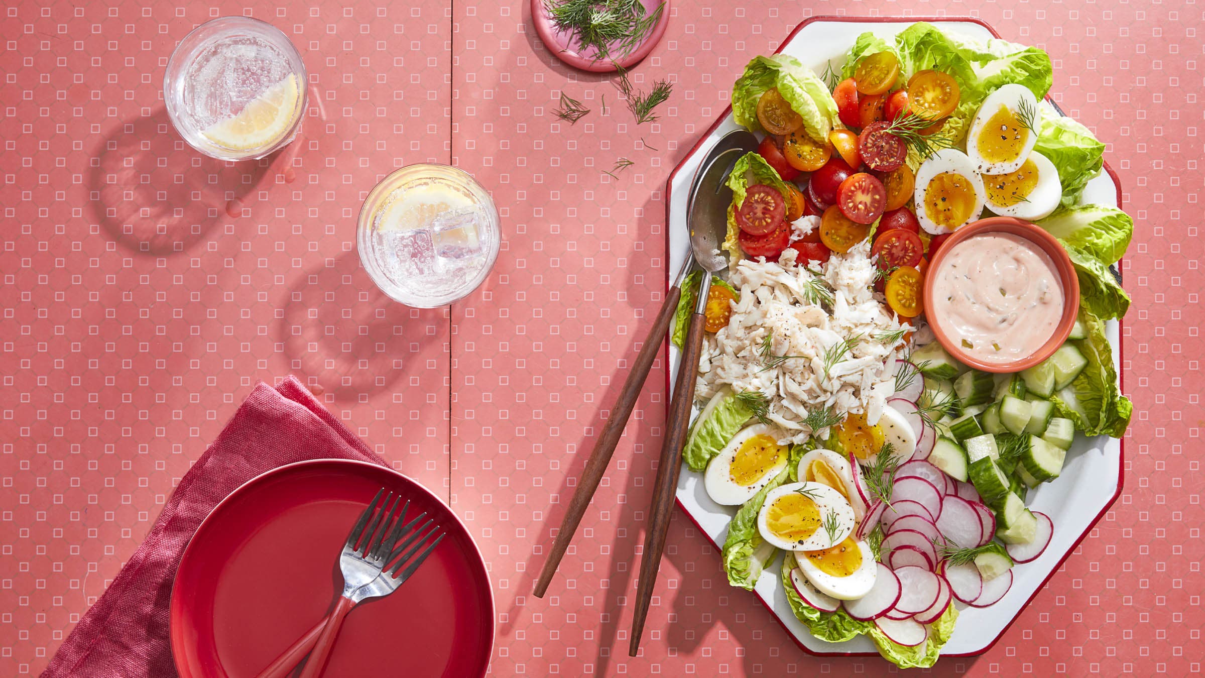 Crab louie salad on red background