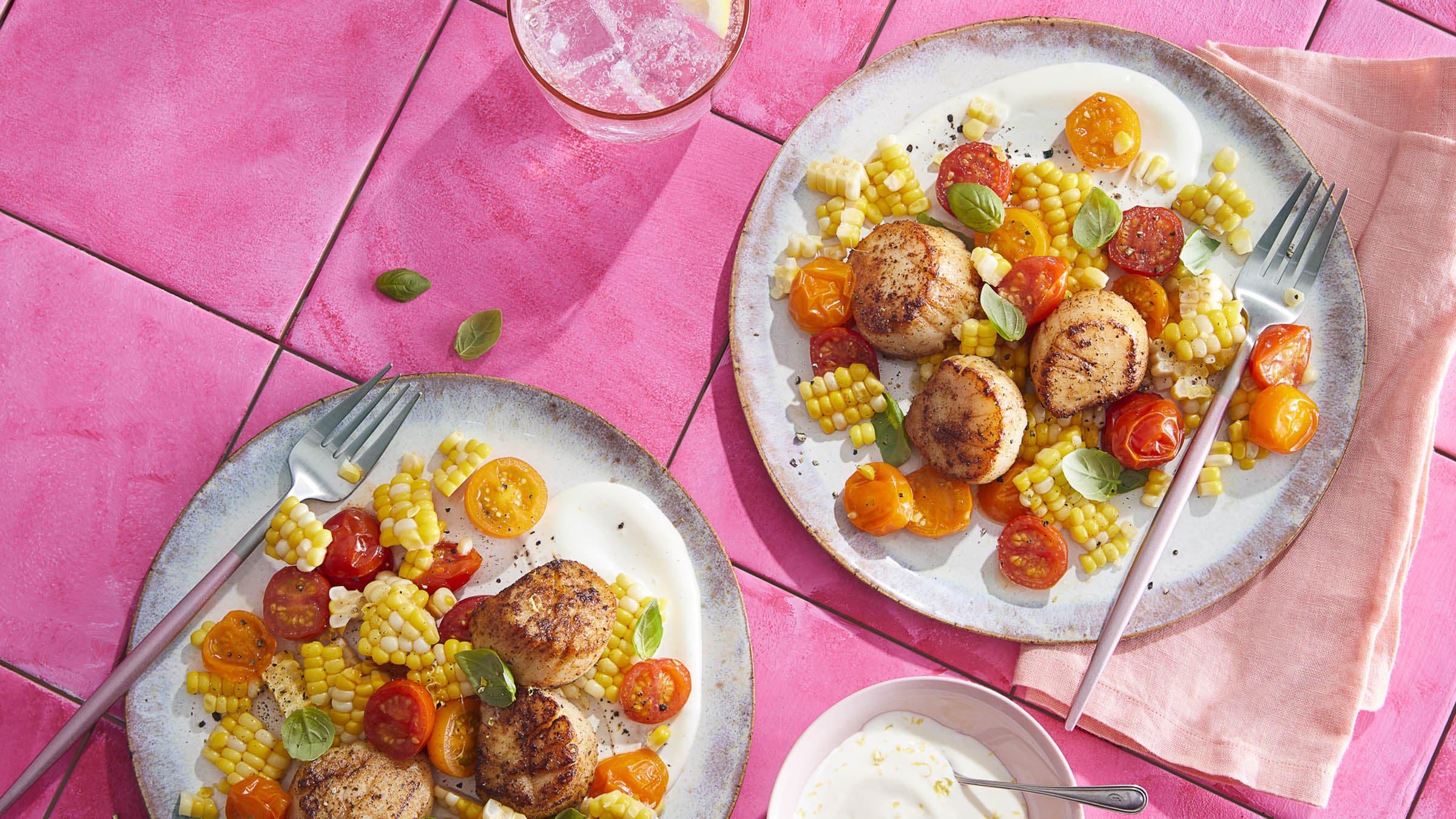 Old Bay scallops on pink tile