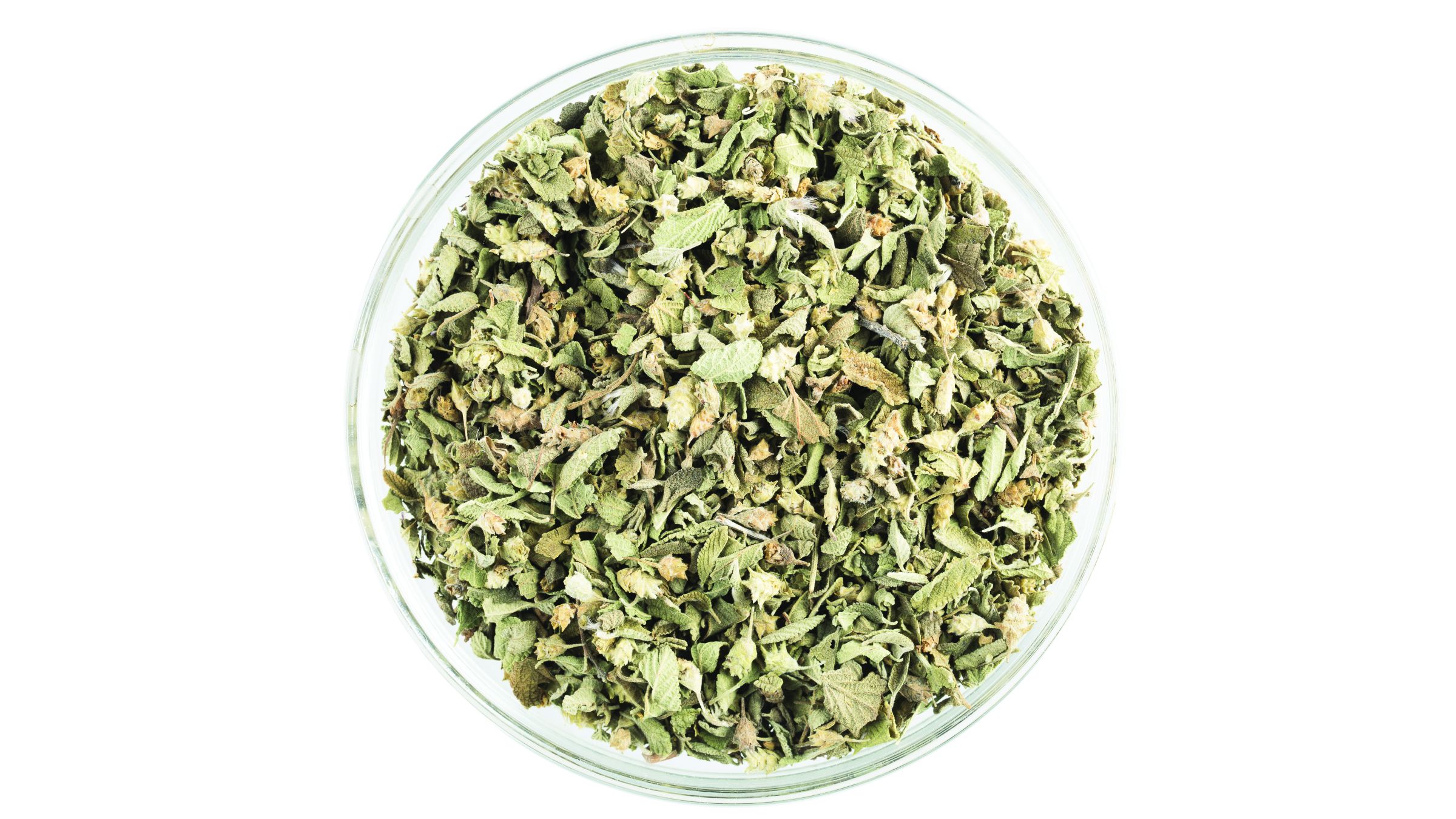 Bowl of Mexican oregano on a white background